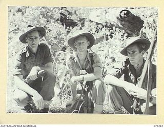 KAMANDRAN, NEW BRITAIN. 1945-02-19. VX46465 SERGEANT B. PERKINS B COMPANY, 1ST NEW GUINEA INFANTRY BATTALION (1); VX23821 CORPORAL H.N. WEBSTER 28TH MALARIAL CONTROL UNIT (2) AND NX51929 SERGEANT ..