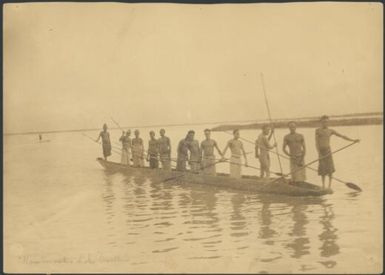 Kambaramba Lake dwellers paddling a canoe, Sepik River, New Guinea, 1935 / Sarah Chinnery