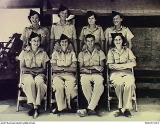 LAE, NEW GUINEA. WW2. MEMBERS OF FIRST MEDICAL AIR EVACUATION UNIT. BACK ROW, FROM LEFT: SISTER CHICK SHEA; SENIOR SISTER BETTY SMITH; SISTER TESS DU MOULIN; SISTER MASON. FRONT ROW: SISTER COLLEEN ..