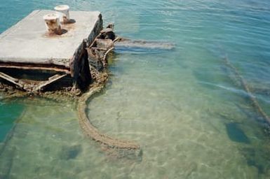 View looking down on the portside of the battleship USS ARIZONA (BB 39) showing the foundation of the casemate for the 5/51 caliber guns. The ARIZONA was sunk in the opening moments of the Japanese attack on Pearl Harbor on December 7, 1941