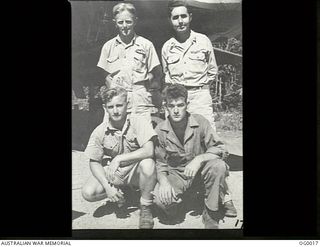 PORT MORESBY, PAPUA. C. 1943. RAAF AND USA AIRMEN WHO FLY TOGETHER AS THE CREW OF AN AMERICAN B-25 MITCHELL BOMBER AIRCRAFT. BACK ROW, LEFT: FLIGHT SERGEANT ROBERT H. GUTHRIE RAAF OF CLAREMONT, WA; ..