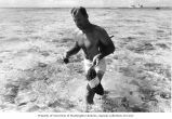 Ralph F. Palumbo with collected algae specimens from Bikini Lagoon, summer 1964