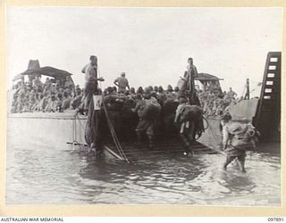 KAHILI, BOUGAINVILLE. 1945-09-30. THE SURRENDER COMMISSION FROM HEADQUARTERS 2 CORPS IS SUPERVISING THE TRANSPORT OF JAPANESE ARMY AND NAVY TROOPS FROM THE BUIN AREA TO THE CONCENTRATION AREA ON ..