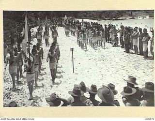 KELANOA, NEW GUINEA, 1944-02-20. THE GRAND MARCHPAST AT A BEACH CARNIVAL ORGANISED BY CAPTAIN A.E. RICHARDS AND SERGEANT P.J. HORAN OF THE AUSTRALIAN ARMY AMENITIES SECTION, 5TH DIVISION. 5TH ..