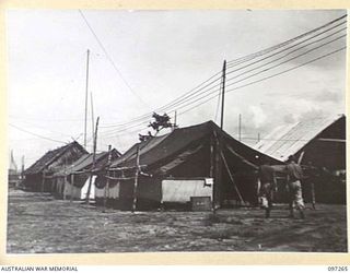 CAPE WOM, NEW GUINEA. 1945-09-29. THE AERIAL NETWORK AT RADIO 6 DIVISION BROADCASTING STATION, HEADQUARTERS 6 DIVISION. THE STATION REOPENED ON 6 SEPTEMBER 1945