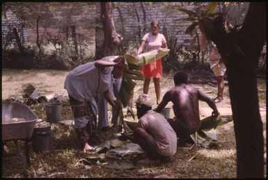 Malaria Control Service national staff prepare an earth oven for a party (5) : Papua New Guinea, 1976-1978 / Terence and Margaret Spencer