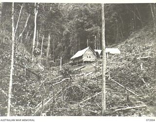 IMITA, NEW GUINEA. 1944-04-30. THE IMITA SIGNAL STATION, 18TH AUSTRALIAN LINES OF COMMUNICATION SIGNALS, VIEWED FROM THE NORTHERN END OF THE TRAIL