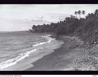 RABAUL, NEW GUINEA. 1946-07-04. THE BEACH WHERE A SMALL JAPANESE TASK FORCE LANDED. 22ND BATTALION AND MEMBERS OF THE NEW GUINEA VOLUNTEER RIFLES WERE STATIONED HERE TO CLEAR RESISTANCE AND TO ..