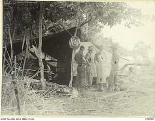 DANMAP RIVER AREA, NEW GUINEA. 1944-12-28. THE REGIMENTAL AID POST OF THE 2/11TH INFANTRY BATTALION. IDENTIFIED PERSONNEL ARE:- WX77337 CAPTAIN D.S. STUCKEY, MEDICAL OFFICER (1); SERGEANT F.W. ..