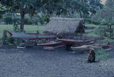 [Outrigger canoes on shore in Safotu, Samoa]