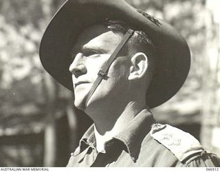 WONDECLA AREA, QLD. 1944-05-23. VX7516 LIEUTENANT C.K. CULLEN, MBE., OF THE 2/5TH INFANTRY BATTALION, WHO RECEIVED HIS AWARD FOR SERVICE IN NEW GUINEA