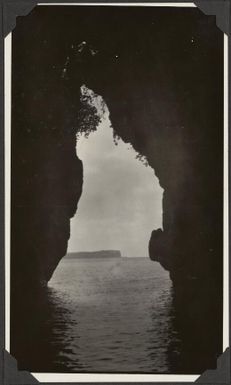 Opening in the cliff face with a view to a landmass, Apolima [?], Samoa, 1929 / C.M. Yonge