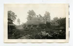 [Photograph of Soldier on Tank]