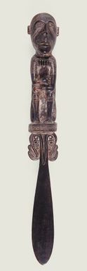 Figure in the form of a Lime Spatula by Mutuaga