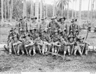 MADANG, NEW GUINEA. 1944-07-08. PERSONNEL OF NO.15 PLATOON, C COMPANY, 24TH INFANTRY BATTALION. IDENTIFIED PERSONNEL ARE:- PRIVATE T.P. LENANE (1); PRIVATE C.B. STEVENS (2); PRIVATE R. SANG (3); ..