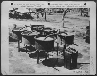 Steam heated wash rack of the 90th Bomb Gp. At Port Moresby, Papua, New Guinea, Sept. 43. (U.S. Air Force Number B59587AC)