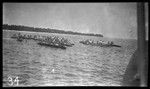 Men in canoes