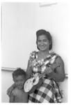 Woman with child and ukelele