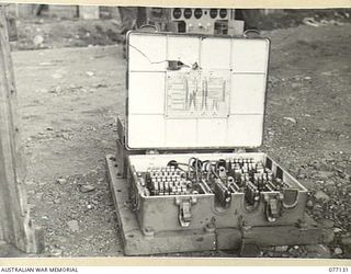 LAE AREA, NEW GUINEA. 1944-11-27. THE DISTRIBUTOR BOARD OF A CAPTURED JAPANESE AIRCRAFT PREDICTOR IN THE MUSEUM OF THE ASSISTANT QUARTERMASTER GENERAL (E) 1ST AUSTRALIAN ARMY