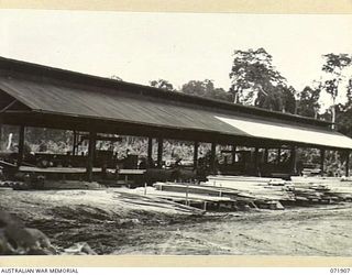 LAE, NEW GUINEA. 1944-03-30. A GENERAL VIEW OF THE SAWMILL AT 59TH CORPS FIELD PARK COMPANY, WHICH CUT MATERIAL FOR THE BUILDING FROM THE SURROUNDING FORESTS. THE ERECTION OF THE BUILDING WAS ..