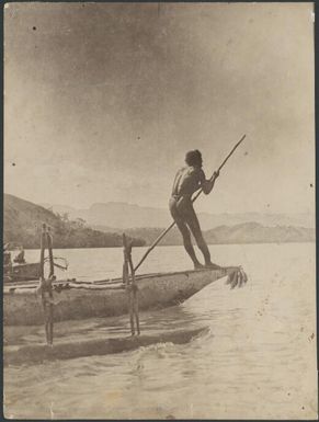 Man poling outrigger canoe, poling, Bootless Inlet, Papua, 1922 / Sarah Chinnery