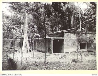 BUIN AREA, BOUGAINVILLE. 1945-09-28. ENTRANCES TO THE UNDERGROUND WIRELESS STATION AND COMMUNICATION CENTRE CONSTRUCTED OF REINFORCED CONCRETE AT THE JAPANESE NAVAL HEADQUARTERS IN THE BUIN AREA. ..