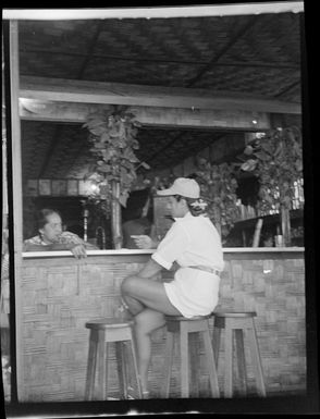 Street scene, patron in bar socialising, Quinns Tahitian Hut, Tahiti