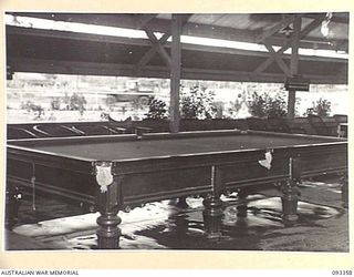 LAE AREA, NEW GUINEA, 1945-06-30. THE BILLIARD TABLE AT 112 CONVALESCENT DEPOT, WHICH WAS DONATED BY THE AUSTRALIAN COMFORTS FUND