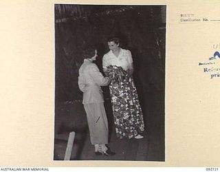 LAE AREA, NEW GUINEA. 1945-06-05. A CONCERT WAS GIVEN AT THE OPEN AIR THEATRE OF 2/7 GENERAL HOSPITAL. THE PERFORMERS WERE FROM STAFF OF 2/7 GENERAL HOSPITAL, LAE CHORAL GROUP AND THE LAE PLAY ..