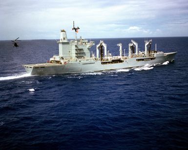 A starboard view of the fleet oiler USS CIMARRON (AO 177) underway
