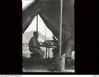 NADZAB, NEW GUINEA. C. 1944-02. AT NO. 24 MEDICAL CLEARING STATION RAAF THE OFFICER'S MESS IS ACCOMMODATED IN A TENT