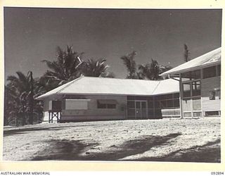 JACQUINOT BAY, NEW BRITAIN. 1945-06-09. THE X-RAY AND OPERATING ROOM AT 2/8 GENERAL HOSPITAL IN 5 BASE SUB-AREA. IT IS BUILT OF LOCALLY CUT AND SAWN TIMBER WITH ROOF AND SIDES OF GALVANISED IRON ..