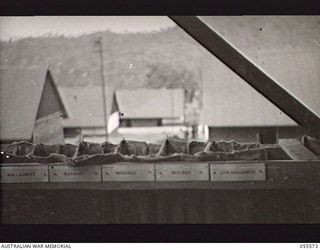 PORT MORESBY, NEW GUINEA. 1943-08-05. BAGS READY TO RECEIVE VOTING PAPERS FOR THE ELECTION AT HEADQUARTERS, NEW GUINEA FORCE