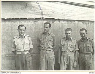 LAE, NEW GUINEA. 1945-09. STAFF OF LAE RADIO STATION, (9.AB). THEY ARE OPERATING A SET THAT WAS ORIGINALLY BUILT OF JUNK, MAINLY JAPANESE. THE PRESENT TRANSMITTER HAD LESS JAP MATERIAL IN IT THAN ..