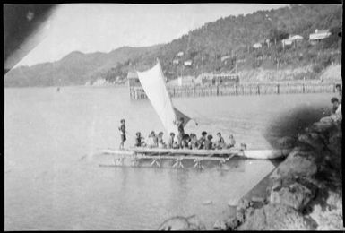 Outrigger canoe with a sail, leaving the shore, Lorengau, Manus Island, New Guinea, 1935 / Sarah Chinnery