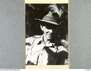 1942-08-06. WITH THE ALLIED TROOPS IN NEW GUINEA. RIFLEMAN HARRY HELTON, WHO KNOWS AS MUCH ABOUT THE WILDS OF NEW GUINEA AND OF THE NATIVES AS ANY MAN. OF IRISH-SCOTCH-AUSTRALIAN DESCENT HE HAS ..