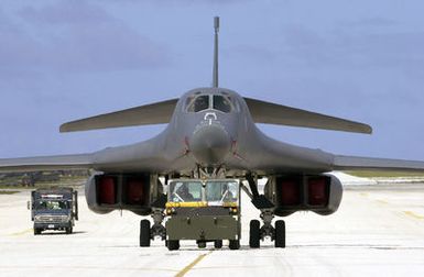 A US Air Force (USAF) B-1B Lancer gets towed with a MB-2 aircraft tow tractor to a new parking spot on the ramp at Andersen Air Force Base (AFB), Guam. The B-1B is here in support of the 7th Air Expeditionary Wing's (AEW) mission