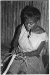 Moruka of Ga'enaafou, 'Elota's daughter, plaiting a bag