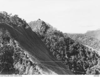 SHAGGY RIDGE, NEW GUINEA. 1944-01-22. LOOKING TOWARDS MADANG FROM SHAGGY RIDGE SHOWING THE "PIMPLE" IN THE FOREGROUND