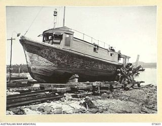 MILNE BAY, NEW GUINEA. 1944-05-16. THE AUSTRALIAN ARMY SMALL CRAFT AM5 ON THE SLIP AT KWIARA WATERCRAFT WORKSHOP, OPERATED BY THE 1ST WATER TRANSPORT GROUP, AUSTRALIAN ELECTRICAL AND MECHANICAL ..