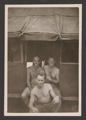 [Servicemen Sitting in Doorway]
