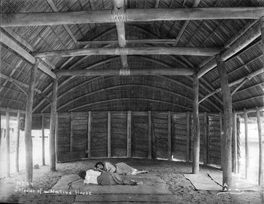 Tattersall, Alfred James, 1866-1951 :House interior with women on sleeping mats, Samoa