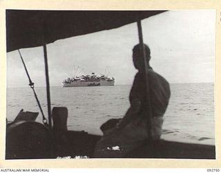 WEWAK AREA, NEW GUINEA. 1945-05-30. SS TAROONA VIEWED FROM THE MOTOR LAUNCH WHICH TOOK THE MOVEMENT CONTROL OFFICER OUT TO THE SHIP IN WEWAK HARBOUR. THE SHIP, FORMERLY ON THE INTERSTATE PASSENGER ..