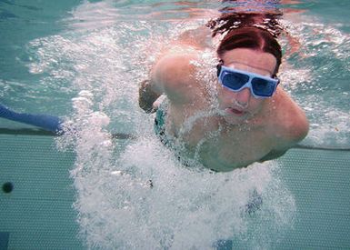 Retired U.S. Navy CMDR. John Brooke swims laps at the Naval Base Guam Pool, during his lunch break. Brooke swims laps everyday to maintain good physical condition and to lose weight. The pool is equipped with 25-foot swim lanes, a recreational area and baby pool. (U.S. Navy PHOTO by Mass Communication SPECIALIST 2nd Class John F. Looney) (Released)