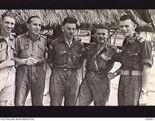 PORT MORESBY, NEW GUINEA. 1943-09-13. PERSONNEL OF THE MILITARY HISTORY SECTION ATTACHED TO HEADQUARTERS, NEW GUINEA FORCE. LEFT TO RIGHT: LANCE SERGEANT N. B. STUCKEY; SERGEANT (SGT) F. R. MUSSON; ..