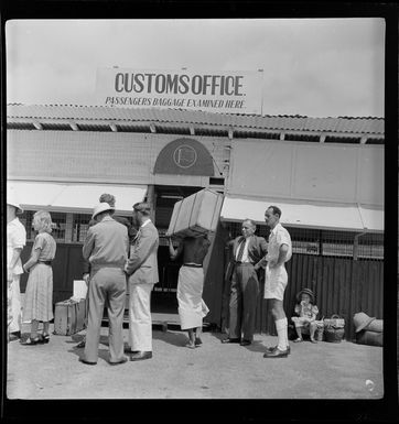 Qantas Empire Airways, Bird of Paradise service, passengers, waiting outside the Customs Office, Port Moresby, Papua New Guinea