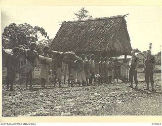 ILOLO, NEW GUINEA, 1944-03-30. VX76415 LIEUTENANT R. B. EWERS (1), WAR ARTIST, MILITARY HISTORY SECTION, ATTACHED TO HEADQUARTERS NEW GUINEA FORCE, WITH VX128013 SERGEANT G. J. BROWNING (2) AND ..