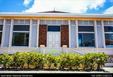 New Caledonia - red-brick building with white doors and details