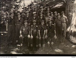Lae, New Guinea. 1944-06-29. Group portrait of members of the Camp Administrative Staff of HQ, New Guinea Force. Left to right: Back row: N206481 Lance Corporal C. M. Bridge; Sergeant (Sgt) ..