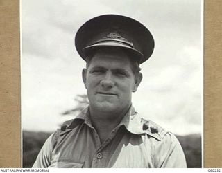 12 MILE, LALOKI RIVER, NEW GUINEA. 1943-11-15. P121 LIEUTENANT T. A. OLSSON, OFFICER COMMANDING, 3RD AUSTRALIAN FARM COMPANY, AUSTRALIAN ARMY SERVICE CORPS